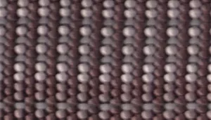 A swatch showing a woven strap in muted mountain‑grey tones. The material consists of alternating light grey and dark charcoal threads woven into a tight linear pattern. The texture is firm and structured, with subtle tonal contrast created by the interlaced fibers.